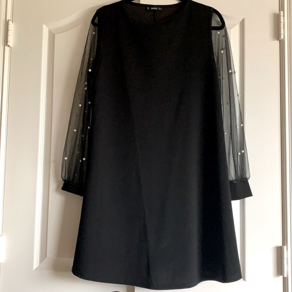 Black dress with pearl details